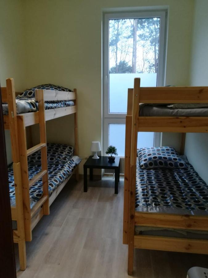 Łóżko w koedukacyjnym pokoju wieloosobowym dla 4 osób